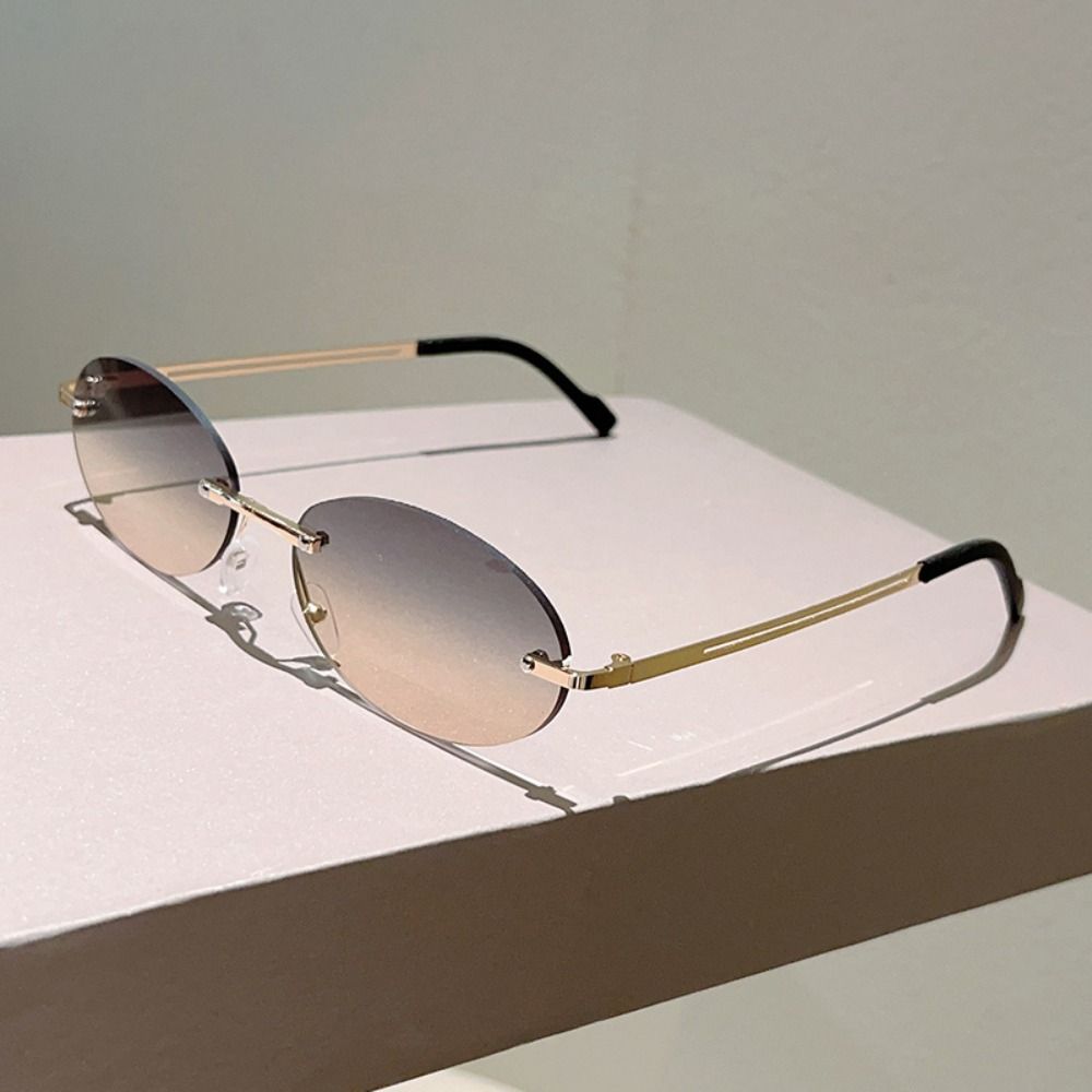 Klassieke randloze ovale zonne - Sunglasses Cat Eye recensie en prijs